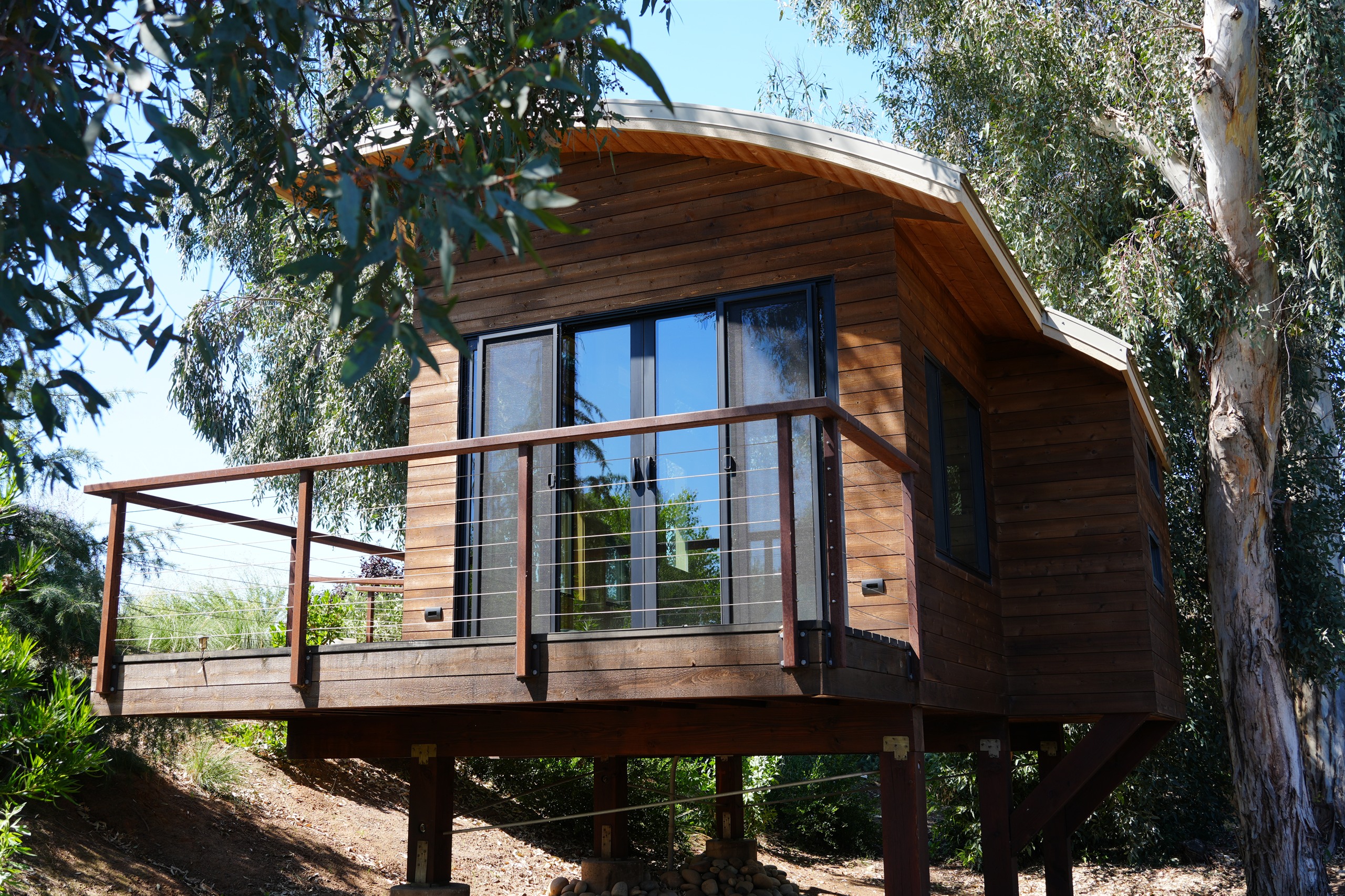 Custom elevated tree house built by Ascent Construction